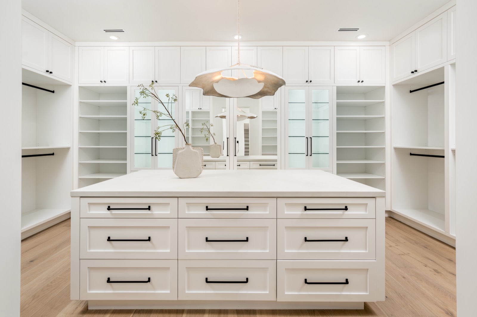Dressing room island with a run of drawers