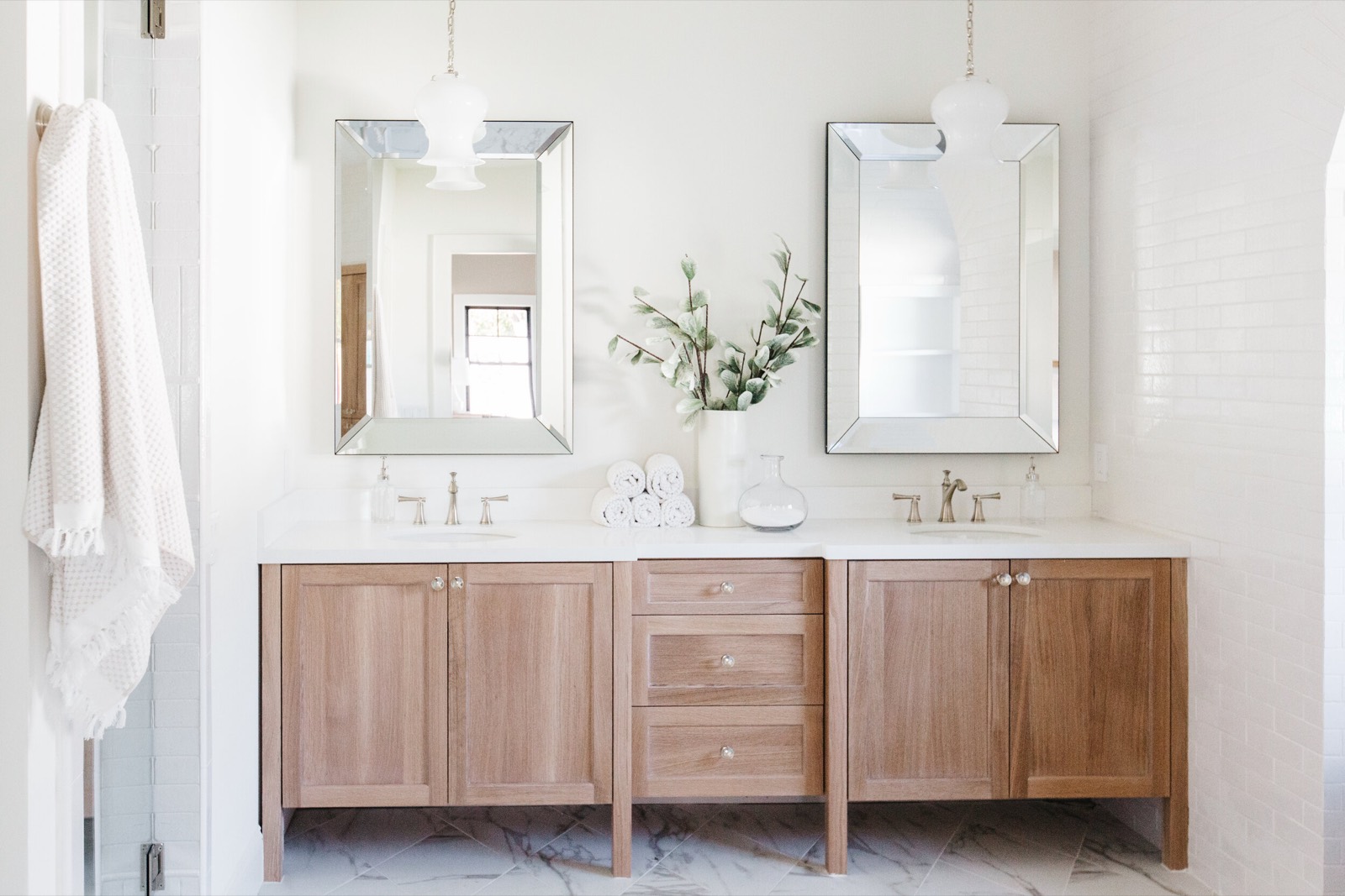 White oak double vanity with framed mirrors