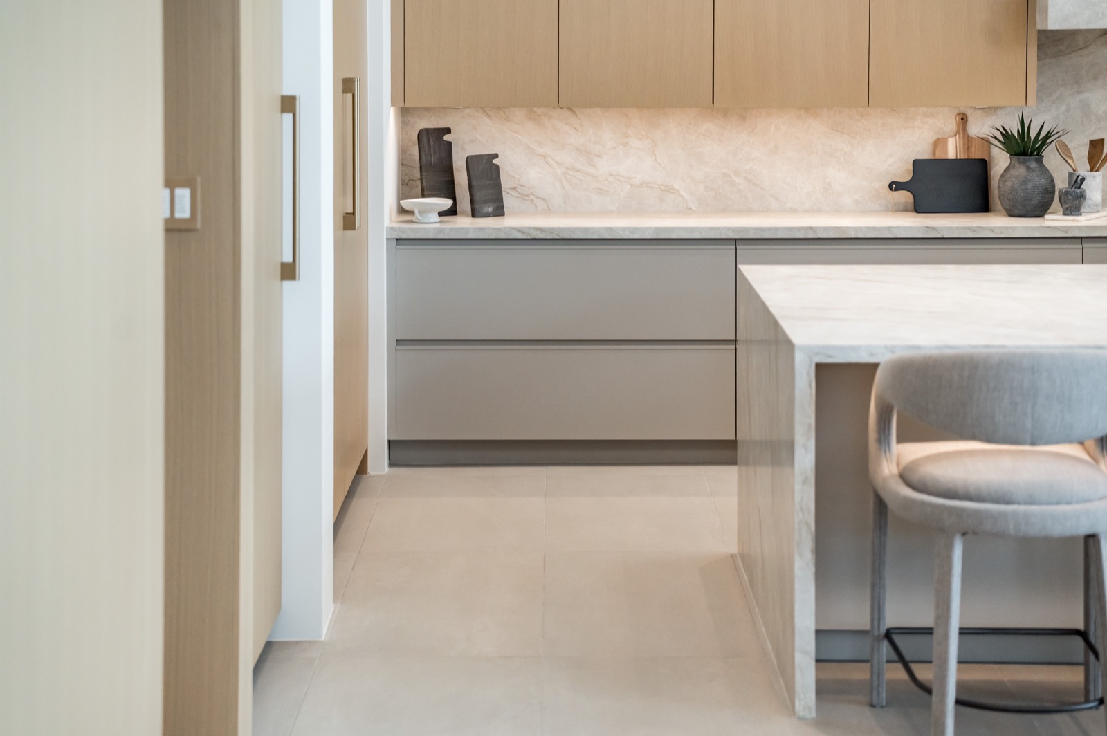 Kitchen island and oak wall seen from the hallway